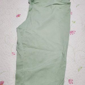 Woman's plus size 32W mint green capri jeans.